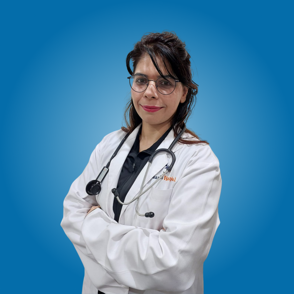 Portrait of Dr. Priyanka Singh, DM Cardiologist, wearing a white medical coat and stethoscope.